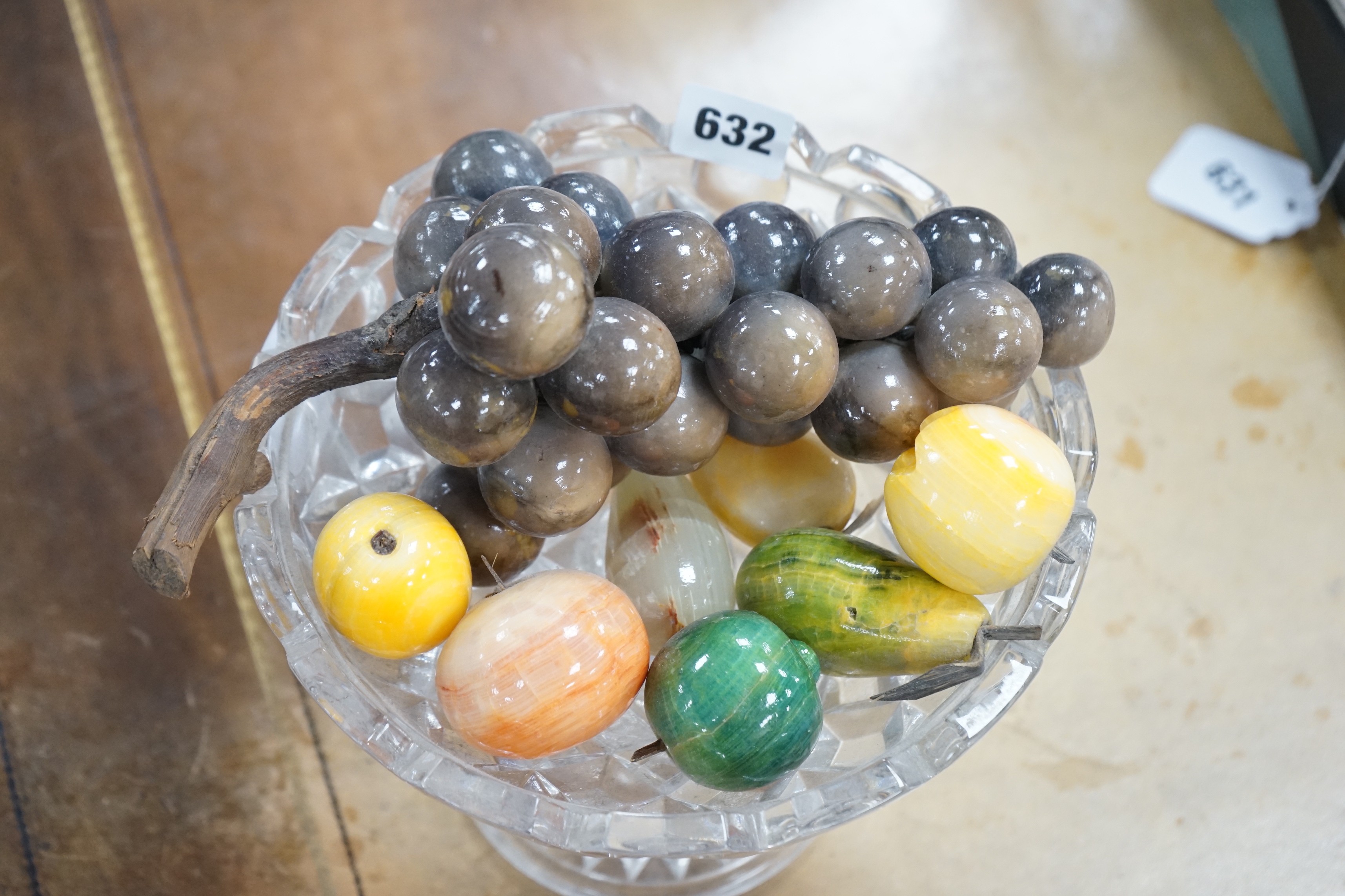 A collection of polished stone fruits
